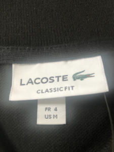 lacoste polo tag