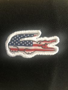 lacoste flag logo